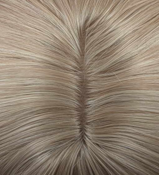 A long straight one-length wig that falls to the waist. This natural light honey blonde colour from roots to tips comes with a sleek blunt fringe.