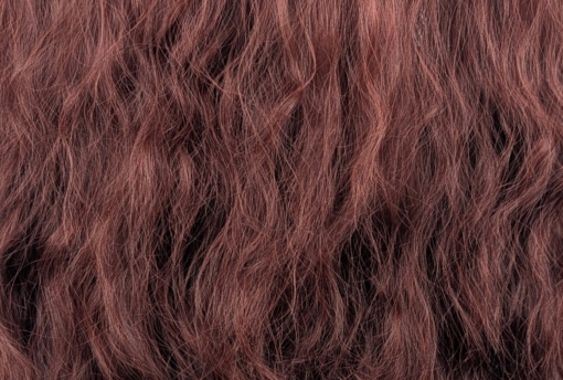 Babooshka - Lush Wigs UK Babooshka is a rich auburn hue with a dash of paprika from roots to tips. Think of braids let loose to create mermaid waves that falls just to the waist. The long sleek fringe allows the freedom to choose between straight across bangs or more of a side fringe.