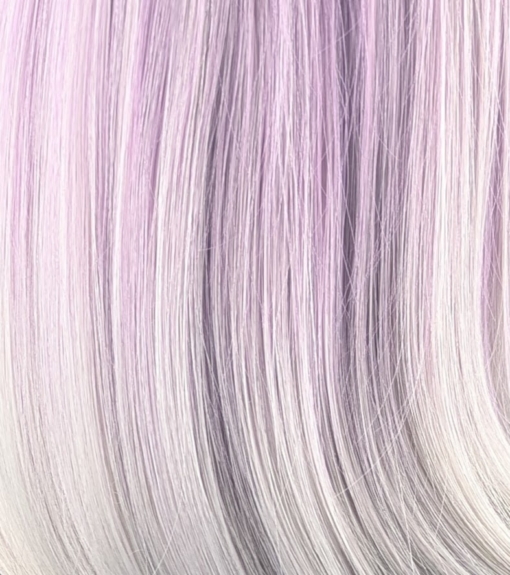 Serene - Lush Wigs UK A beautiful tricolour style ombre. From light brown roots to lilac and grey mix, finished with a dip dye pearly grey colour. It's cut into a long sleek bob with layers making this style easy to maintain. A light blunt fringe finishes the look.