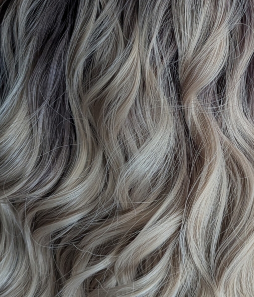 Mocha - Lush Wigs UK This bob is coloured in a honey blonde tone with brown shadowed roots. That gives a natural feel to the look. A loose wave and a sleek fringe finishes the look.