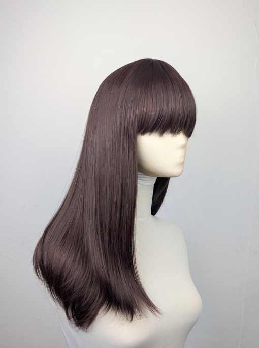Chocolate - Lush Wigs UK This natural wig is a mix of warm auburn and brown colours with russet undertones. Styled sleek with long layers at the front. A full blunt fringe gives a full volume look to this medium-long layered style.