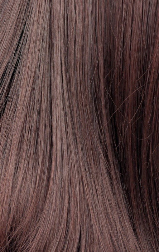 Chocolate - Lush Wigs UK This natural wig is a mix of warm auburn and brown colours with russet undertones. Styled sleek with long layers at the front. A full blunt fringe gives a full volume look to this medium-long layered style.