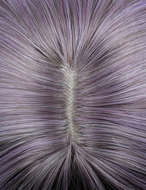 A beautiful tricolour style ombre. From light brown roots to lilac and grey mix, finished with a dip dye pearly grey colour. It's cut into a long sleek bob with layers making this style easy to maintain. A light blunt fringe finishes the look.