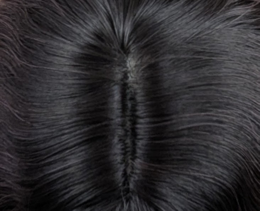 Yoake - Lush Wigs UK This wig has brown shadowed roots that blend into a mix of warm chocolate browns and dark pinks. They create this beautiful rosewood colour. Styled in a loose wave with subtle layers. The light fringe is sleek and blunt.