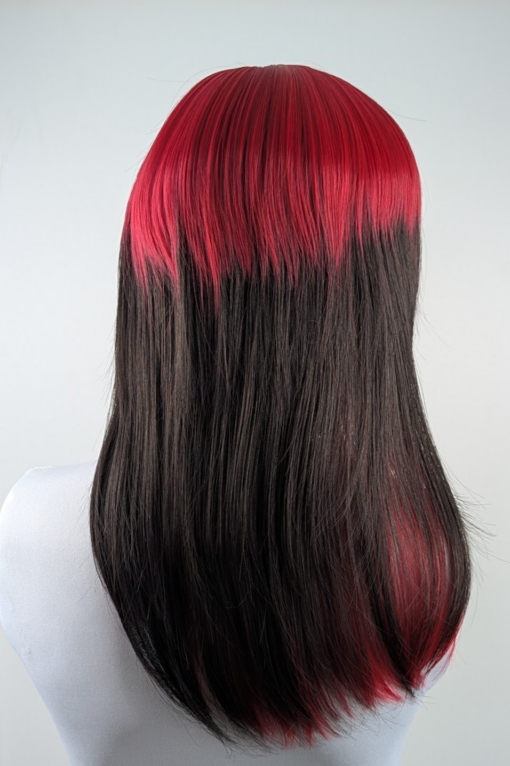 Adore - Lush Wigs UK This glam rock throwback shaggy cut sleek style has red roots and a full red fringe. Cool black tone with a peek a boo red from the nape of the neck.