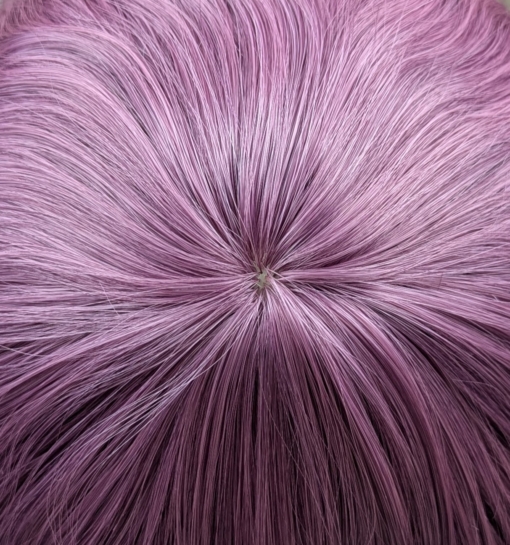 Bloom - Lush Wigs UK A wig a deep lilac pink hue from roots to tips. Think of braids let loose to create mermaid waves that falls to the waist. The long sleek fringe is blunt.