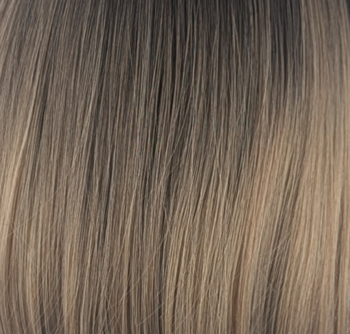 Cedar - Lush Wigs UK This earthy natural wig with light brown roots that blend into a dark blonde ombre. A simple sleek sleek style that curls under just at the ends. Complete with a light sleek blunt fringe.