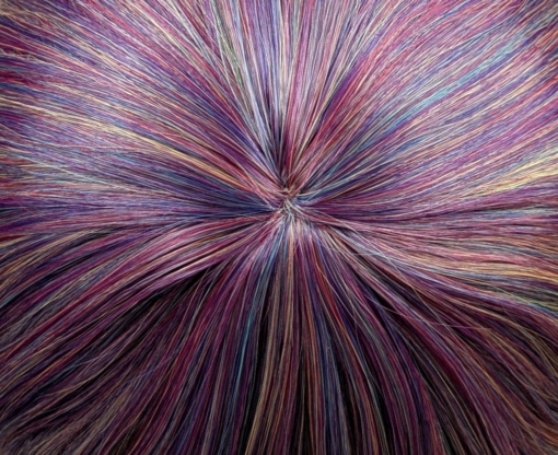 This Vivid wig is a mixture of purples, blues and muted lemon and green tones, from roots to tips. Styled sleek with long layers falling to the waist. The fringe is long and sleek, wear it to the side or parted for curtain bangs.