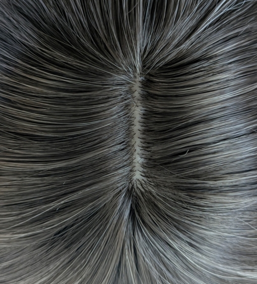 Ice Tea - Lush Wigs UK A wig with brown shadowed roots that grow into this platinum blonde icy hue. Styled into a bob with loose waves. The fringe is sleek and blunt.