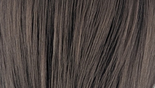 Kosaki takes the lob and turns it on its head. This shaggy sleek cut has body at the crown, with texture and movement around the face. A natural brunette colour.