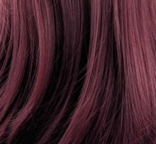 Rey - Lush Wigs UK This sleek style comes in muted merlot red wine colour with warm black shadowed roots for a natural feel. Cut into long layers that fall to the waist. Finished in a barrel brush blow out, with a lightweight sleek fringe.