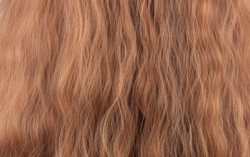 Marmalade - Lush Wigs UK This natural ginger colour from roots to tips. Made up of copper and amber tones. Styled in crimped mermaid waves in layers that fall to the waist. With a blunt sleek fringe.