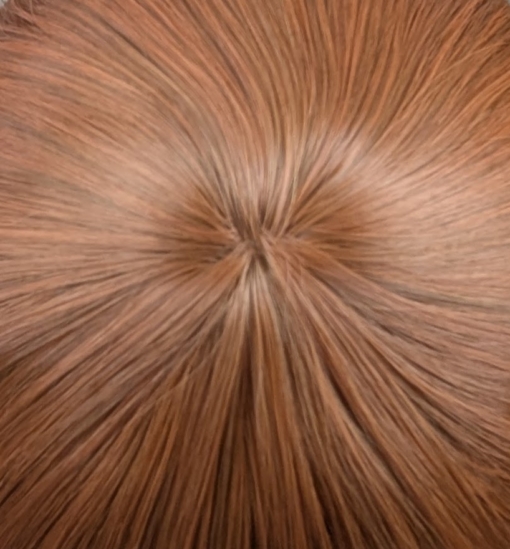 Marmalade - Lush Wigs UK This natural ginger colour from roots to tips. Made up of copper and amber tones. Styled in crimped mermaid waves in layers that fall to the waist. With a blunt sleek fringe.