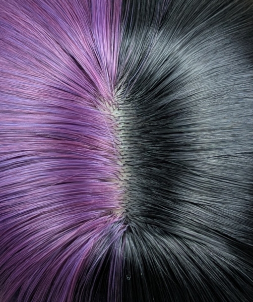 Nova - Lush Wigs UK Nova takes on the dramatic colour divide. Gothic mix of purple and black colours. Split down the centre parting and carrying the colour through the sleek fringe. Styled into a straight one length bob that curls gently at the ends.