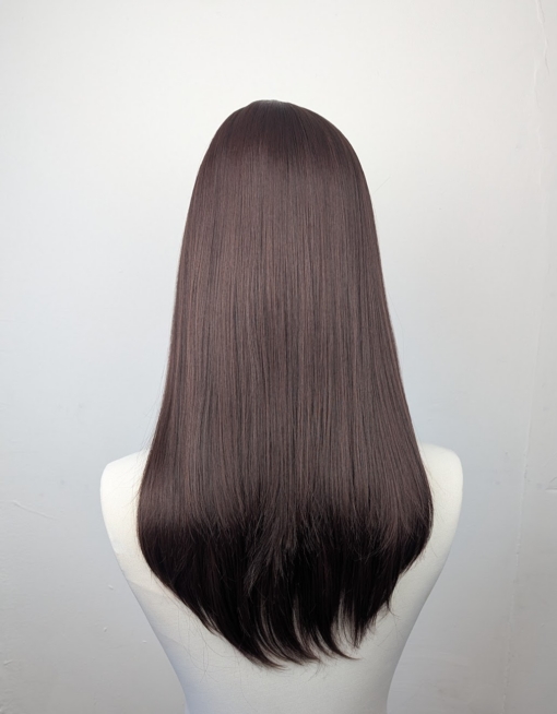 Chocolate - Lush Wigs UK This natural wig is a mix of warm auburn and brown colours with russet undertones. Styled sleek with long layers at the front. A full blunt fringe gives a full volume look to this medium-long layered style.