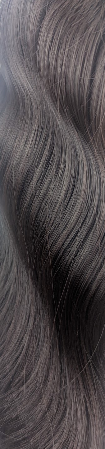 Mayonaka - Lush Wigs UK This natural medium length wig comes in a very dark mix of black and a deep brown cocoa tone. From roots to tips. Styled in loose tousled waves with layers and a blunt sleek fringe.