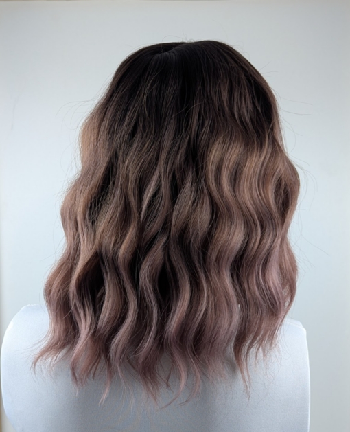 We should let the reviews speak for this one! This natural twist of warm brown shadowed roots that melt into a muted pink and plum mix . Styled into a loose wave and cut into a bob with tapered ends. Easy to wear and maintain with a sleek fringe.
