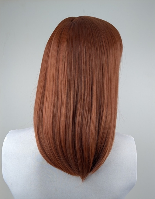 Saffron - Lush Wigs UK A mixture of brunette and cinnamon colours. A sleek long bob with a blunt fringe. A combination of stylish and sassy.