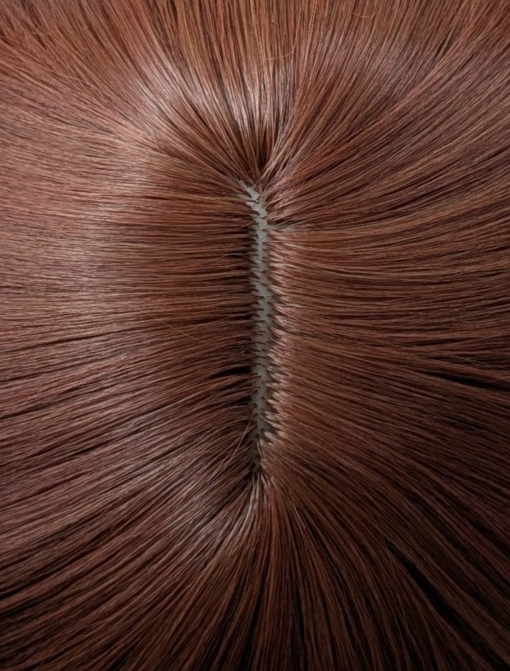 Saffron - Lush Wigs UK A mixture of brunette and cinnamon colours. A sleek long bob with a blunt fringe. A combination of stylish and sassy.