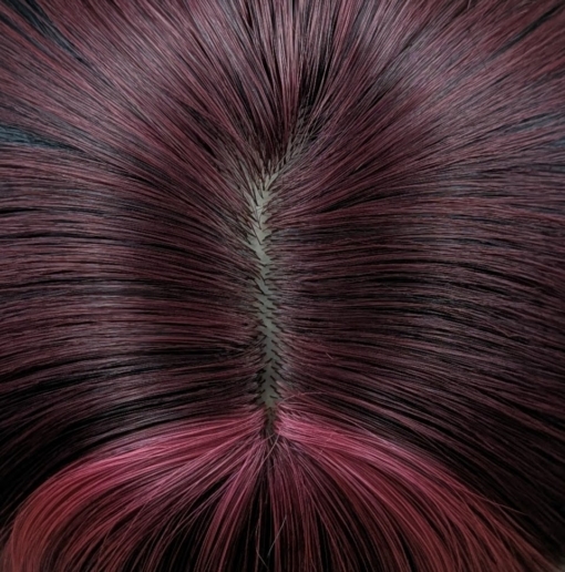 Stitch - Lush Wigs UK This wig is cut into face framing layers with a sleek blunt fringe. A long style with a slice of dark pink at the front. Mixed in with a natural warm black tone to the rest of the head. A block of pink colour from the nape of the neck gives a peek-a-boo effect.