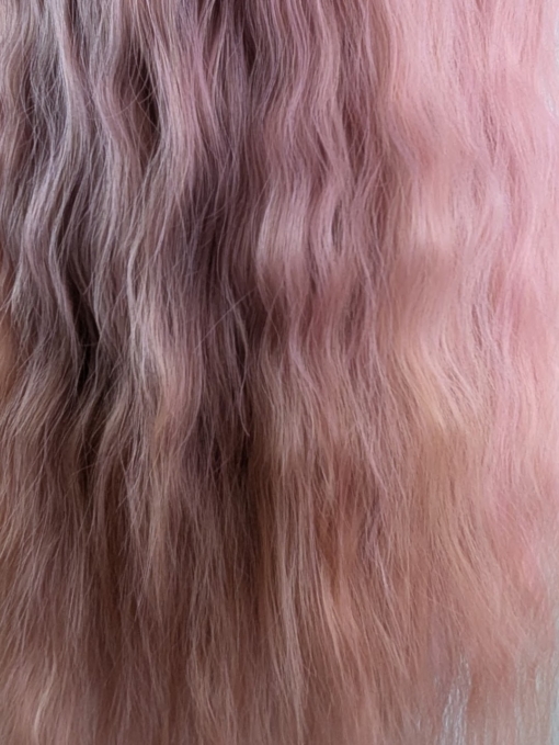 This wig is so fluffy. A soft crimped mermaid waves style in a blend of coral pink that fades into a warm-toned peach. The sleek long fringe is versatile to be worn to suit your look.