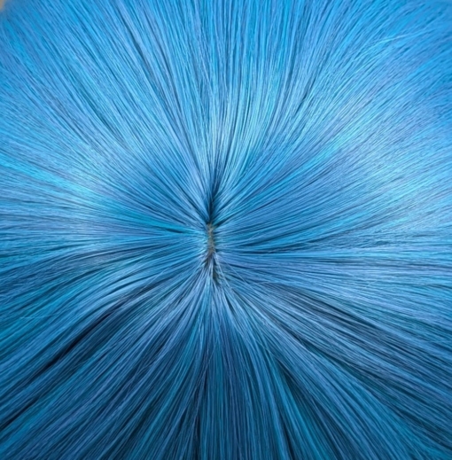 Shades of blue fade into a turquoise colour at the ends. Subtle waves and layers add shape and body. A long sleek fringe can be styled to suit you - however you want to wear it.
