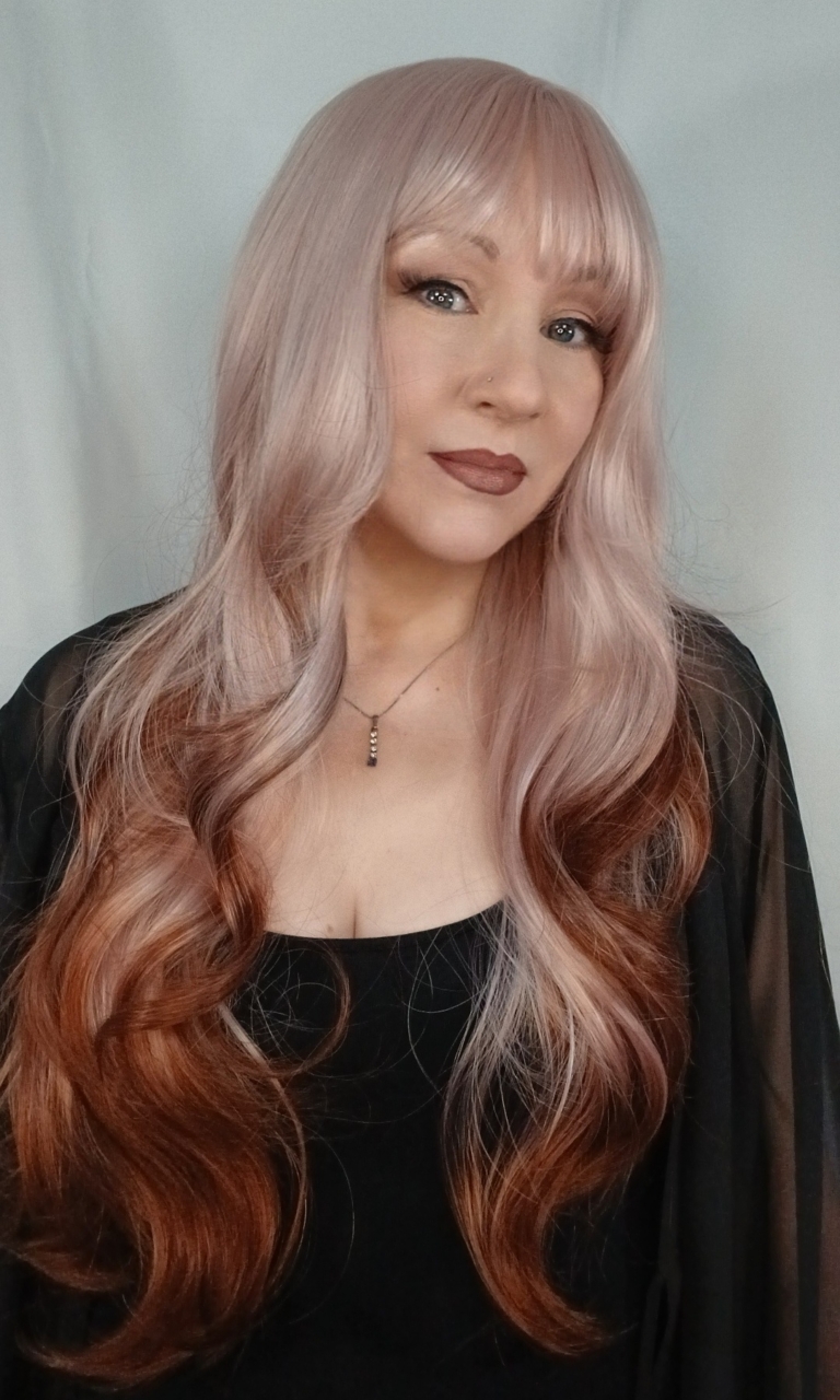 Pink Swirl - Lush Wigs UK This wig comes in a mix of pink and cream roots. They blend into a warm brown hue for a dip dye effect on the ends. A sleek long style with long layers at the back, face framing layers at the front make this style easy to maintain. With a sleek blunt fringe finishes the look.
