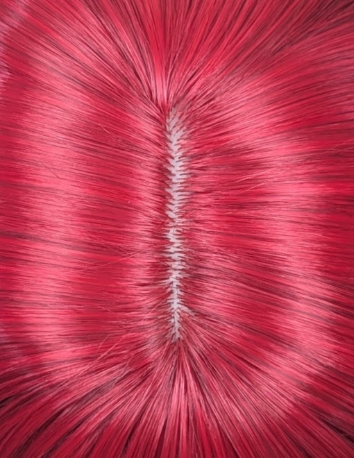 Adore - Lush Wigs UK This glam rock throwback shaggy cut sleek style has red roots and a full red fringe. Cool black tone with a peek a boo red from the nape of the neck.