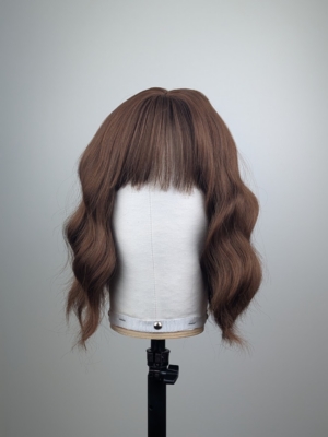 Chai is a natural and simple bob style that comes in a light brown colour. Styled in loose beachy waves for texture.