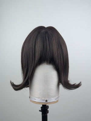 This natural brown from roots to tips sleek bob, with a subtle flick. finished with a sleek fringe.