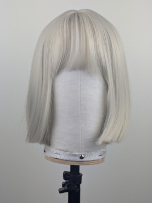 Outlet #270 - Lush Wigs UK A classic one length bob in a diamond blonde colour from roots to tips. Cut into a sleek blunt on length style with light fringe.